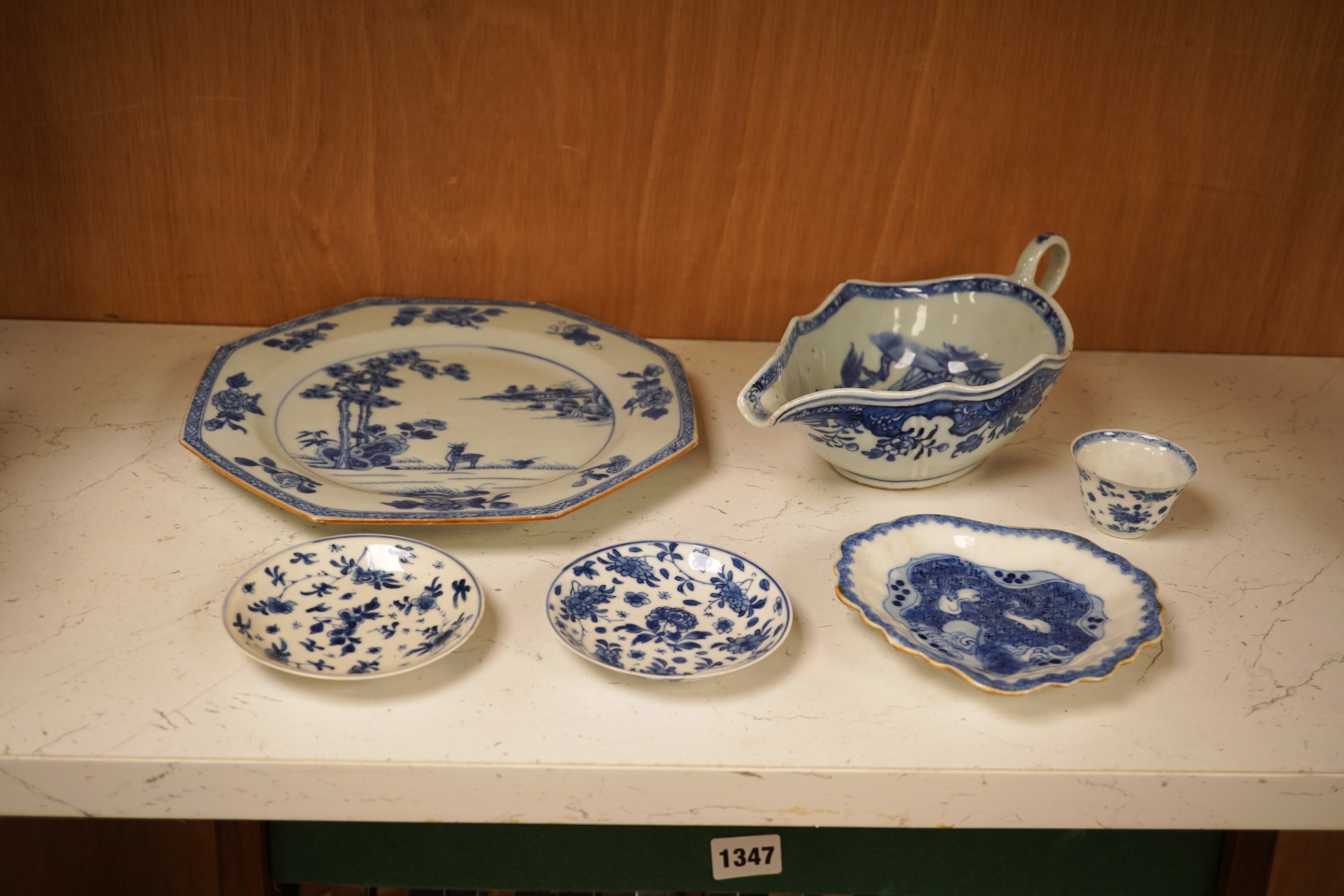 A Chinese export blue and white blue plate, sauceboat and Ko-sometsuke type dish together with a miniature tea bowl and two saucers. Plate 22cm diameter